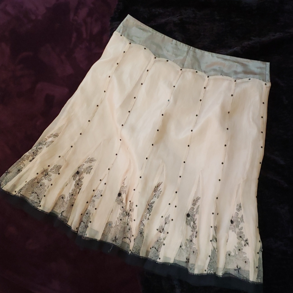A-line cream and black skirt